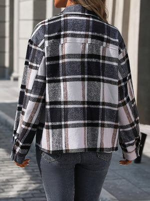 Black plaid overshirt with button front and patch pockets, shown from the back.