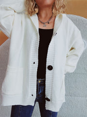 White chunky knit hooded cardigan with button-down front and pockets