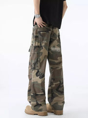Men's distressed camouflage wide leg cargo pants with large pockets and a graphic detail on the back.