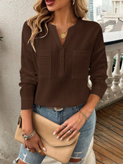 Textured chocolate brown henley blouse with two chest pockets and button detail