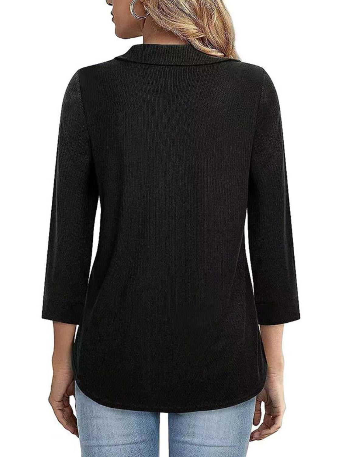 Black textured polo top with 3/4 sleeves and a zip front, shown from the back.