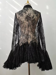 Black floral lace dress with long sleeves, ruffle hem, and sequin details.