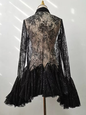 Black floral lace dress with long sleeves, ruffle hem, and sequin details.