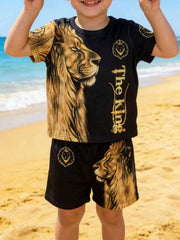 Black baby t-shirt and shorts set with regal lion graphic and "The King" text.