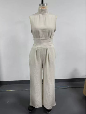 Sleeveless Wide-leg Jumpsuit With Smocked Waist in Apricot, close-up detail