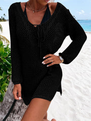 Black open-knit beach dress with lace-up neckline and long sleeves.