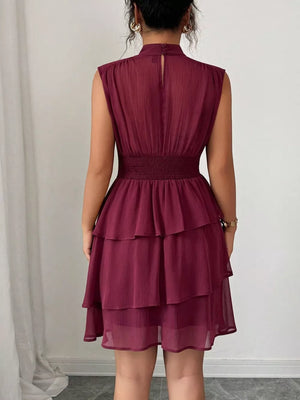 Dark Red ruffled tiered sleeveless dress with smocked waist and mock neck.