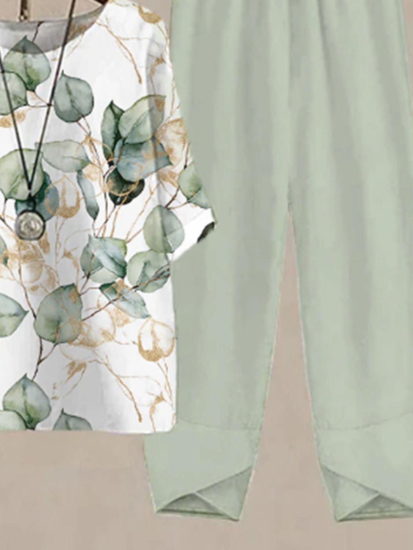 Floral print half sleeve top with Gum Leaf pants set.