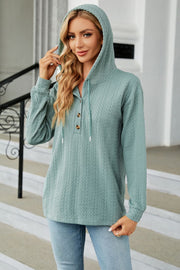 Textured henley hooded knit top in Air Force Blue with button detail and drawstring.
