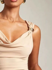 Apricot cowl neck tank top with draped fabric and gold ring detail on strap.