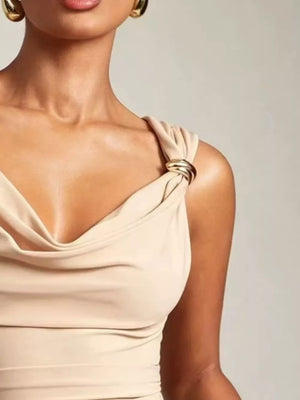 Apricot cowl neck tank top with draped fabric and gold ring detail on strap.