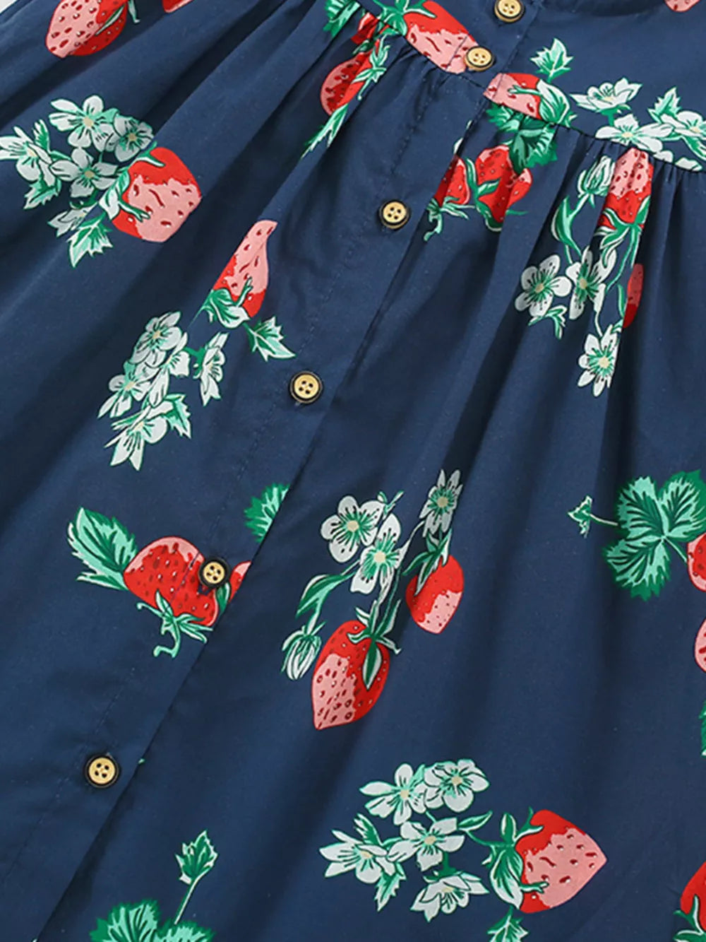 Navy cotton dress with strawberry and floral print, button-down front.