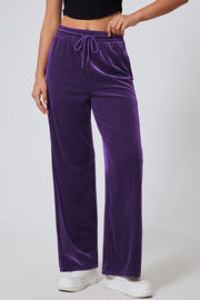 Velvet palazzo lounge trousers in violet with drawstring waist and wide leg