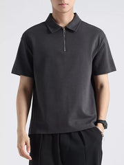 Men's dark gray cotton zippered casual polo shirt with short sleeves.
