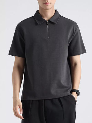Men's dark gray cotton zippered casual polo shirt with short sleeves.