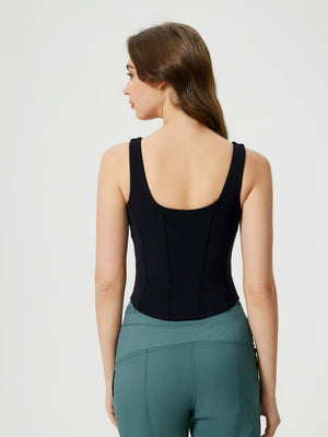 Black tank top with sculpted seams and built-in support, shown from the back.