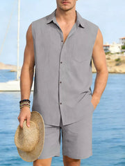 Men's gray linen sleeveless shirt and shorts set with pocket detail.