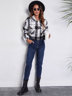 Chic plaid jacket in white and gray with button front and chest pockets.