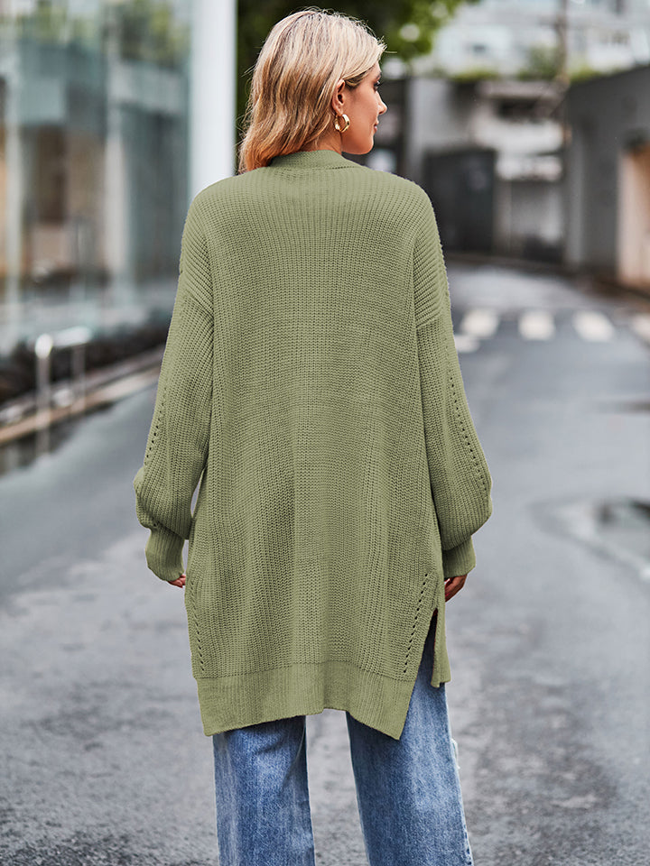 Open-stitch waffle knit duster cardigan in Matcha Green with side slits and balloon sleeves.