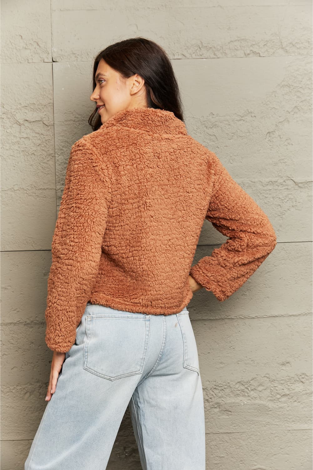 Caramel teddy fleece cropped jacket with collar and long sleeves.