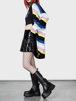 Rainbow stripe oversized knit cardigan with black, yellow, blue, and purple stripes.
