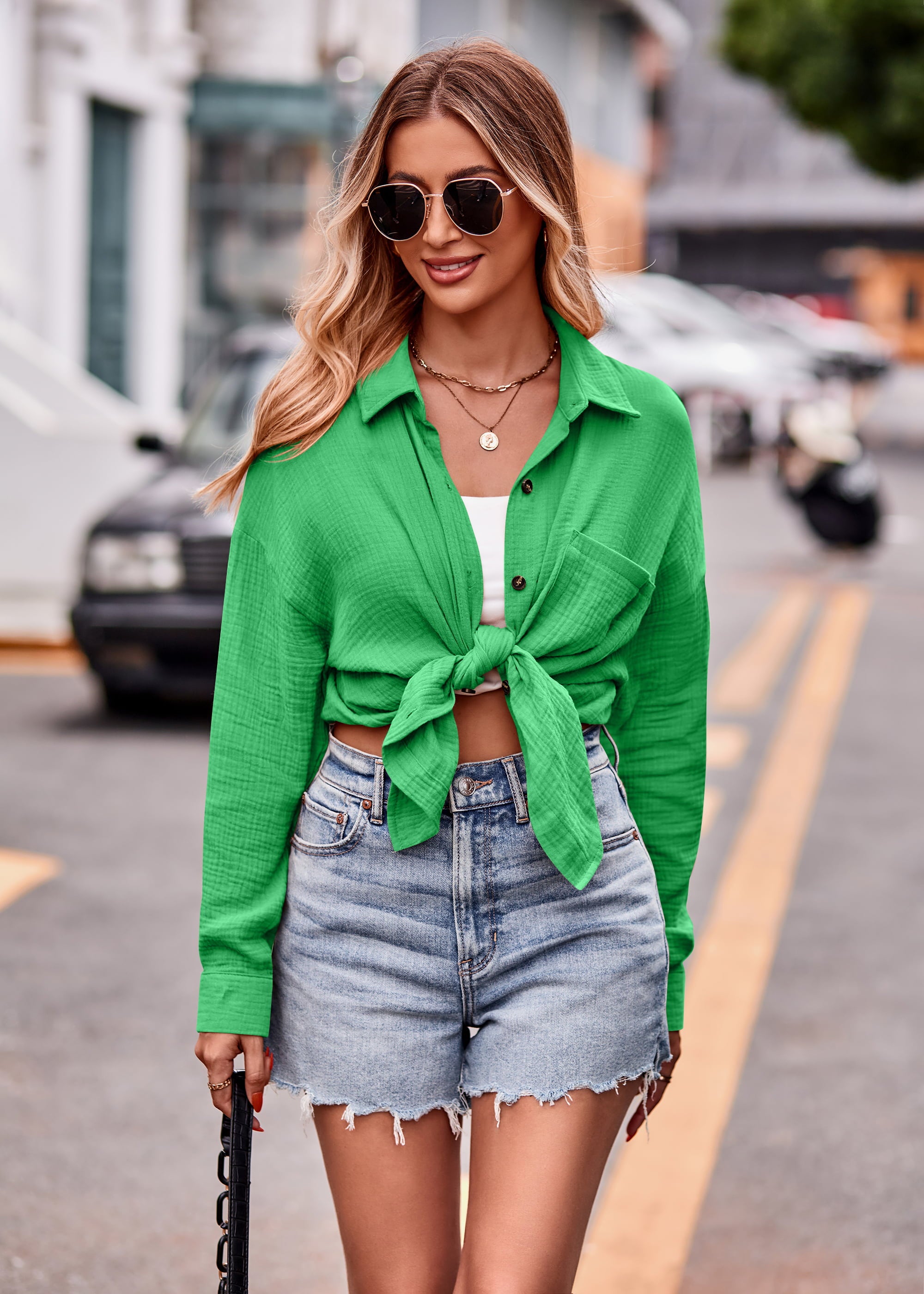 Green textured gauze overshirt with relaxed silhouette, button front, chest pocket, and tie detail.