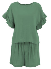 Textured gauze co-ord set in dark green with ruffle sleeves and gathered shorts.