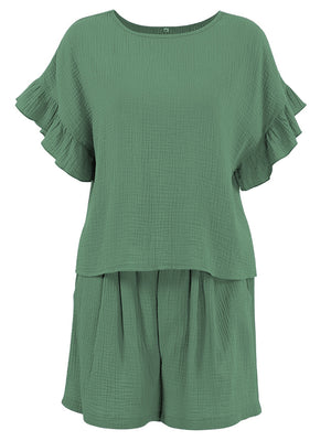 Textured gauze co-ord set in dark green with ruffle sleeves and gathered shorts.