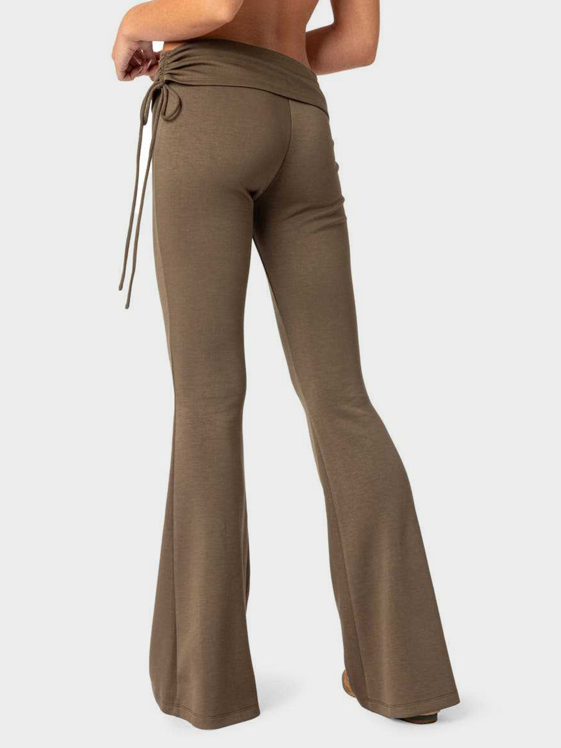 Drawstring waist flare trousers in coffee brown with a ruched detail and tie closure.
