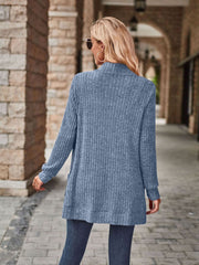 Light blue ribbed open-front cardigan with pockets and a relaxed fit.