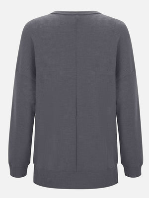 Dark Gray waffle knit crewneck top with relaxed fit and seam detail on back