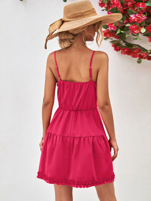 Hot Pink camisole mini dress with tiered ruffled skirt and spaghetti straps.
