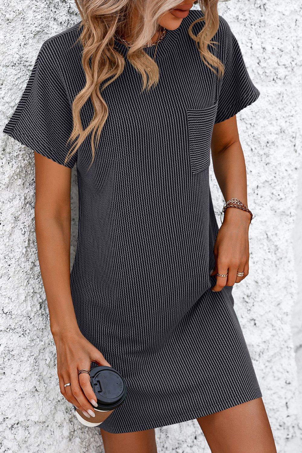 Dark gray ribbed tee dress with short sleeves, patch pocket, and pinstripe pattern.