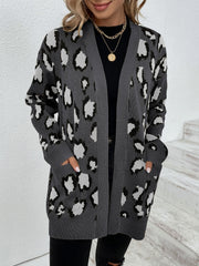 Dark gray leopard print open-front knit cardigan with pockets.