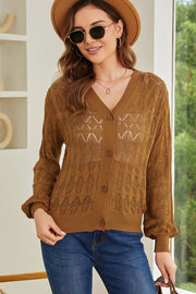 Caramel openwork knit cardigan with balloon sleeves and button front.