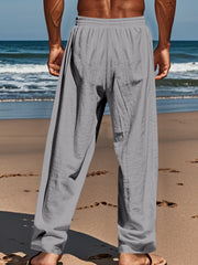 Gray relaxed fit drawstring sweatpants with button-fly and a loose leg