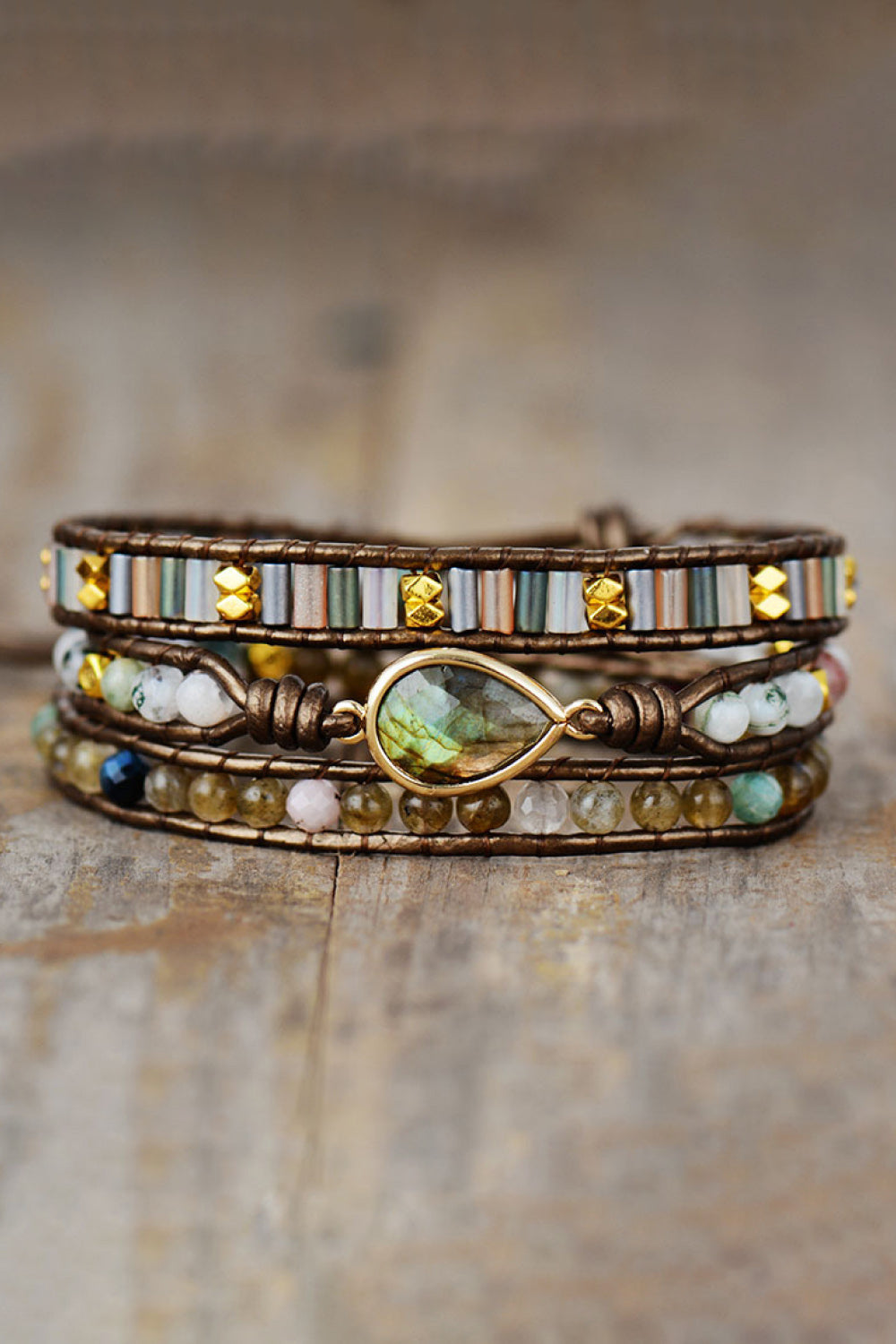 Bohemian wrap bracelet with gemstone focal, agate beads, and gold accents.