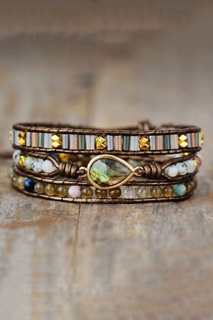 Bohemian wrap bracelet with gemstone focal, agate beads, and gold accents.