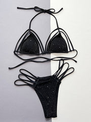 Black sparkly bikini set with strappy details and adjustable ties.
