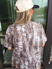 Woodland camouflage tunic with crew neck and short sleeves, featuring a drop shoulder cut.