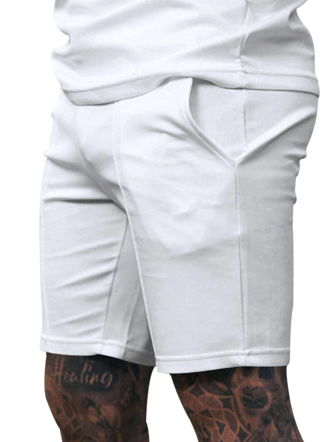 White chino shorts for men with drawstring and side pockets.