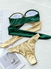 Two-tone bandeau bikini in forest green and gold with ring detail and matching thong.