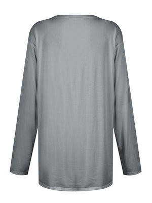 Gray relaxed fit tunic with long sleeves and a crew neck.