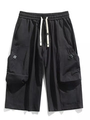 Black cargo capris with adjustable drawstring and large side pockets.