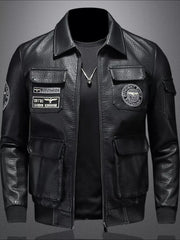 Black leather bomber jacket with multiple patches and cargo pockets.