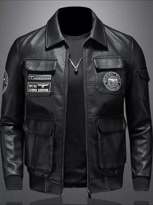 Black leather bomber jacket with multiple patches and cargo pockets.