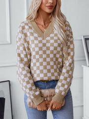 Checkerboard knit v-neck pullover sweater in camel and white, featuring a relaxed fit.