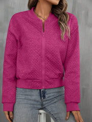 Diamond quilted bomber jacket in deep rose with zip closure and ribbed cuffs and hem.