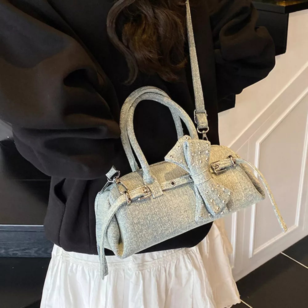 Denim Bow Accent Crossbody Bag in Blue, editorial view