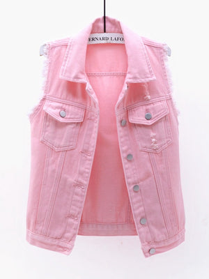 Pink denim vest with frayed shoulders and distressed details